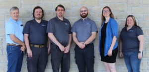 A group photo of the 6 Custom Internet Services team members
