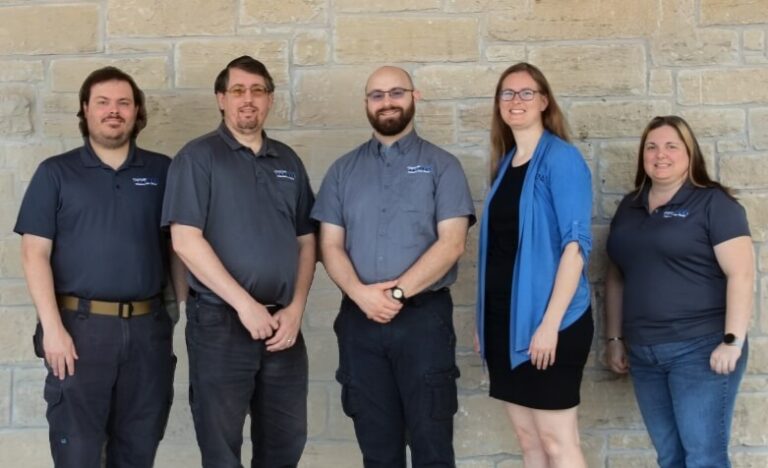 A group photo of the 6 Custom Internet Services team members