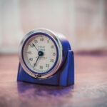 Vintage, blue timer sitting on a table