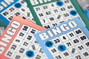 Blue, green, and red Bingo Cards overlapping