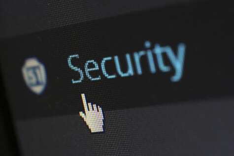 Computer mouse hovering over a button labeled "Security"